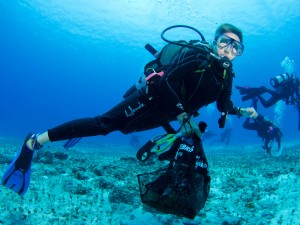 Debra with a bag of debris