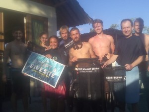 After washing our gear and recording our debris some of us pose for a post dive photo