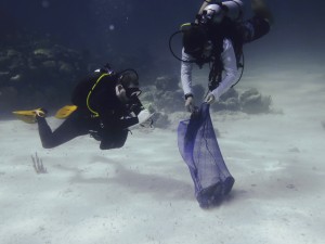 DIVERS REMOVING DEBRIS