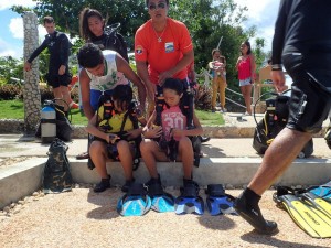 Putting SCUBA Gear on for the first time.