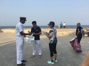 D.I.G coast guard Mr.Sanjiv Trikha and his wife helping us out with the clean upean up