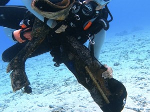 Trinity with underwater debris.