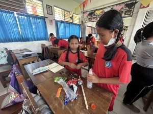 Students making ecobrick