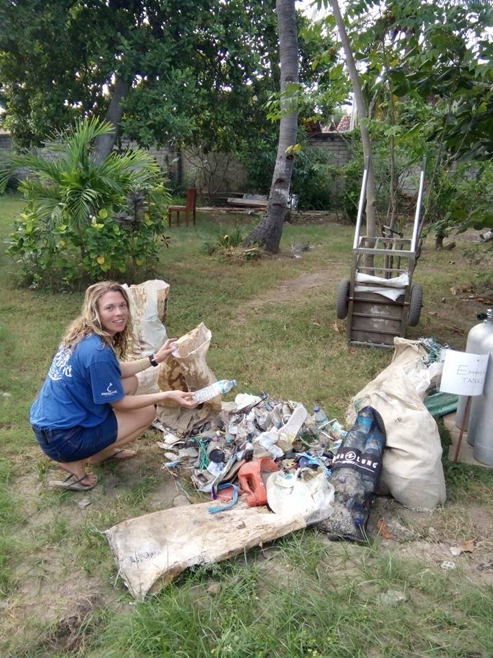 Dorianne  working on the separation of the trash to send to recicle