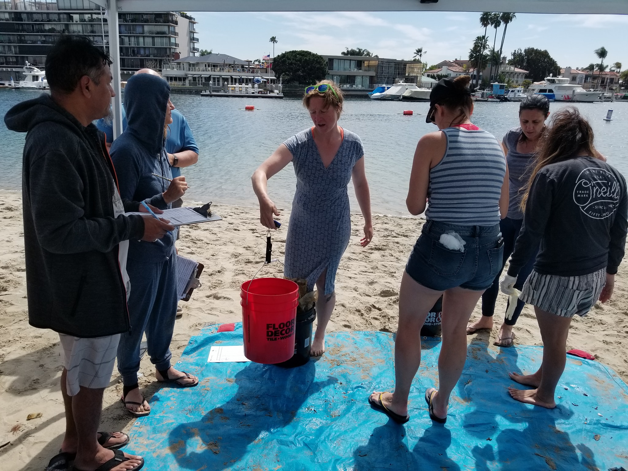 PADI Instructor Ashley Arnold Weighs Trash Found Underwater