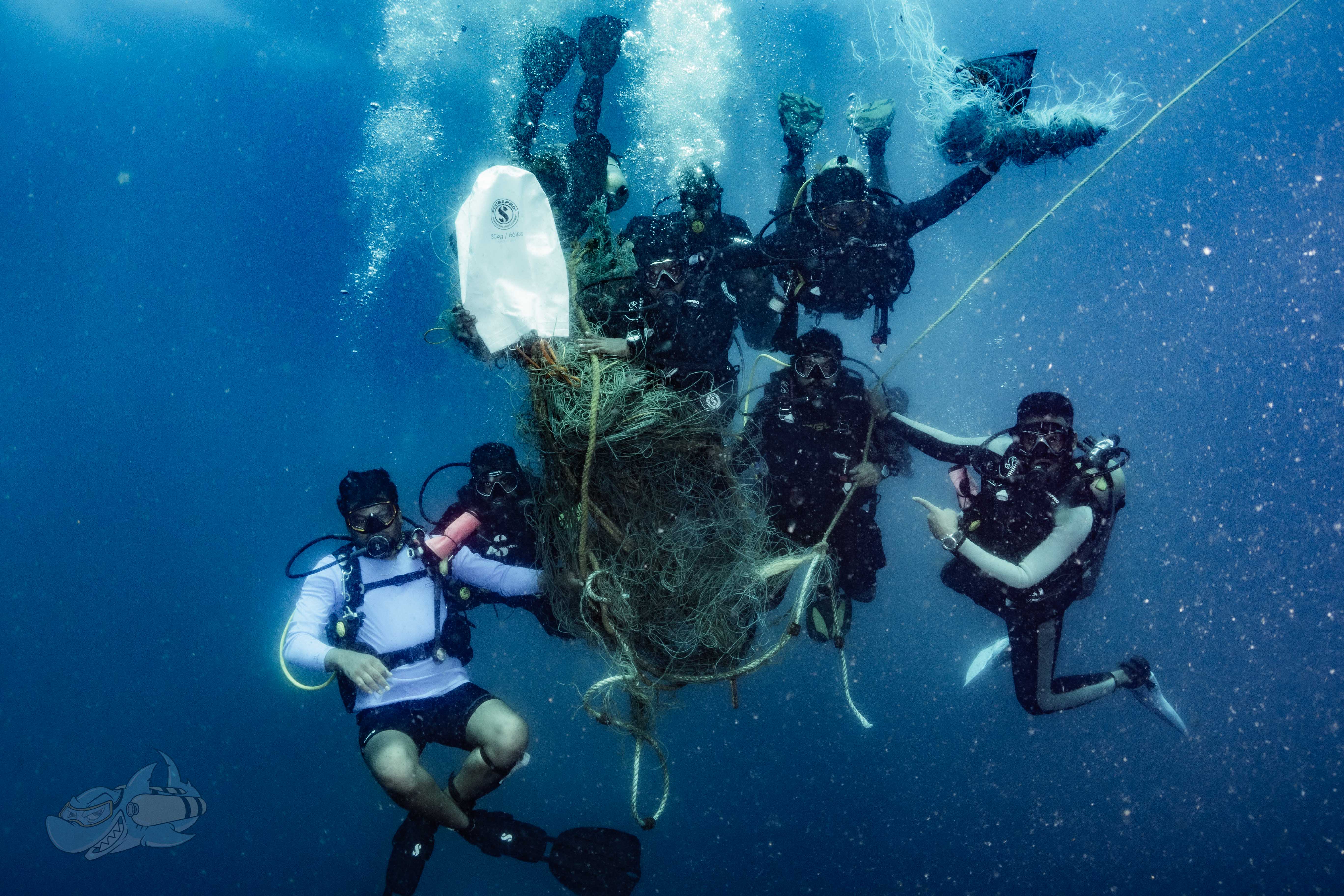 Scuba Divers removing ghost nets 