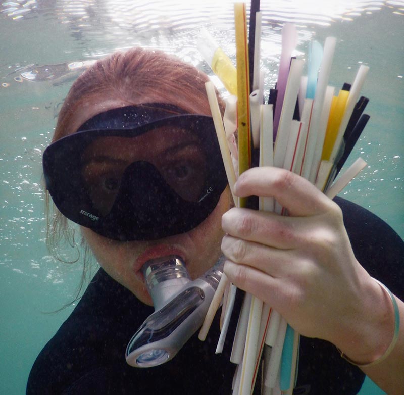 image of snorkeler and plastic straws