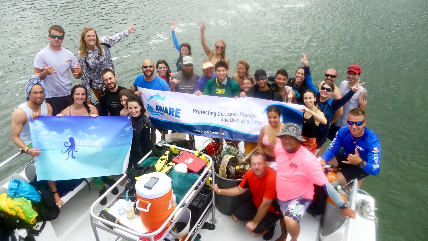 image of Project AWARE team on a boat