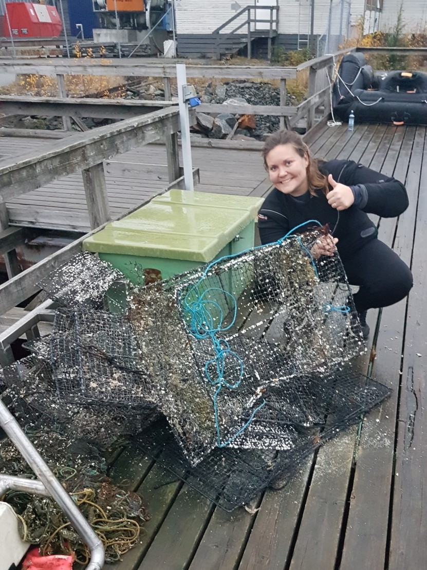 Happy diver after recovering lost fishing gear