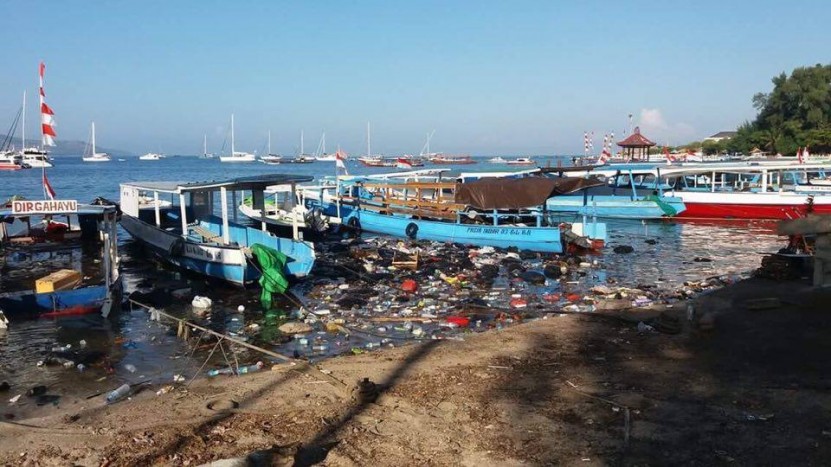 The garbage boat sinking in the harbor