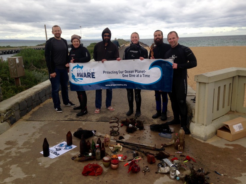 Divers at Mordialloc pier with their debris from the Dive Against Debris