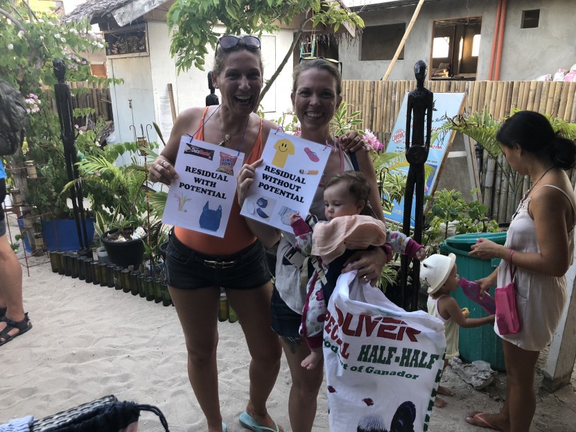 dive instructors and even babies join the Debris Free Beach Cleanup!