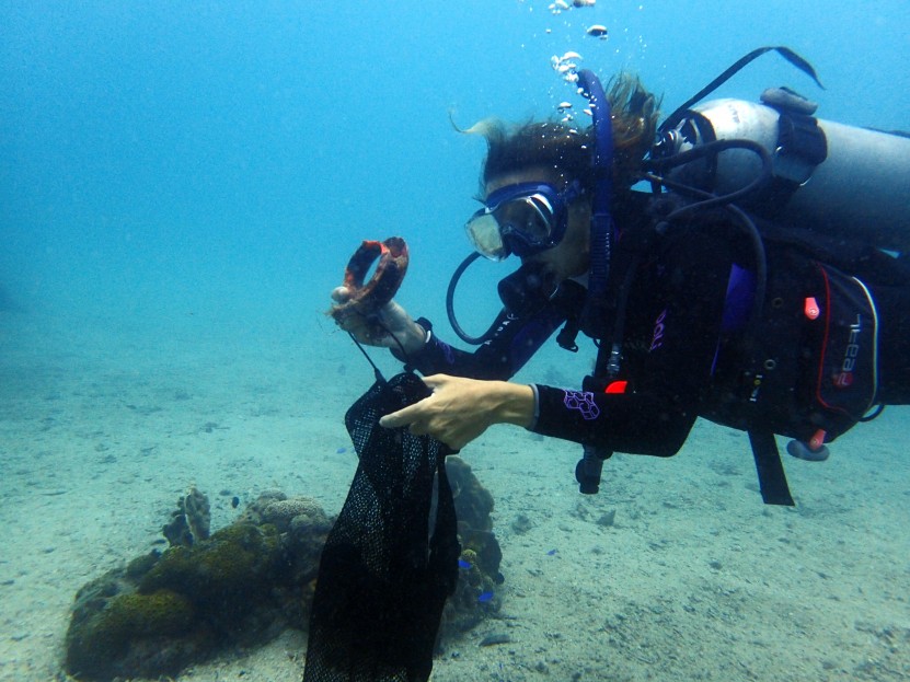 Collecting plastic from Lighthouse reef