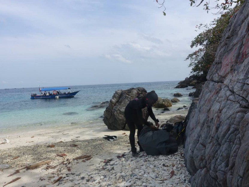 Shana our dive master sorting out the debris