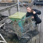 Happy diver after recovering lost fishing gear