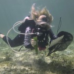 Scuba Diver removing debris