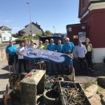 Whole team with Project AWARE banner