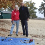 Cindy and John stand behind pieces of trash brought up during the dive!